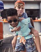 Kid 2-Piece Tropical Print Short-Sleeve Rashguard & Swim Trunks Set - Oragne/Grey, image 7 of 7 slides